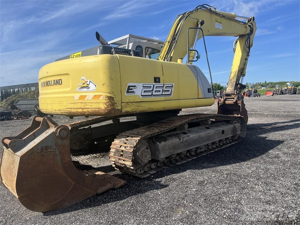 New Holland E 265 B Bageri guseničari