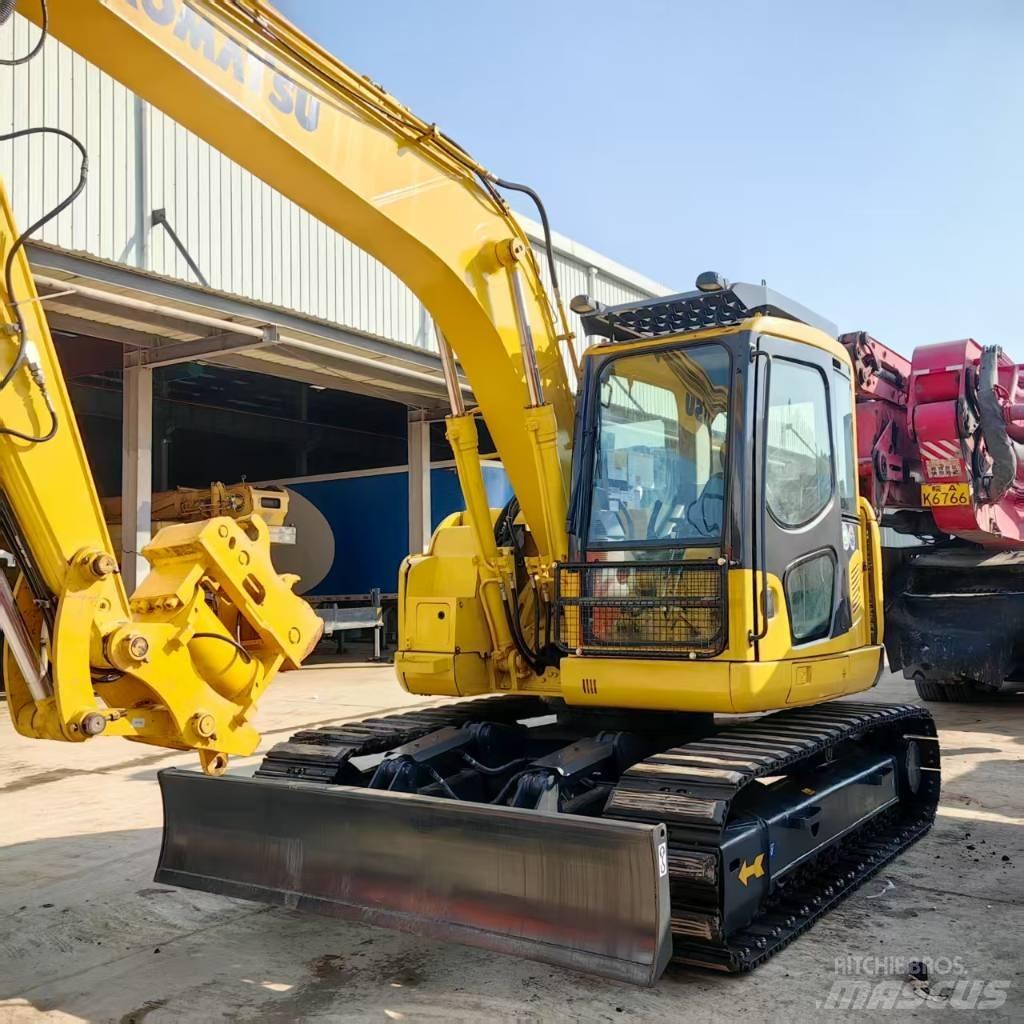 Komatsu PC 128 US Midi bageri 7t – 12t