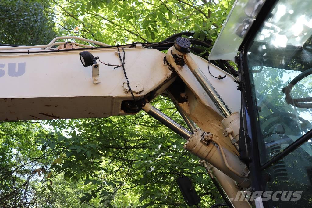 Komatsu PW 140-7 Rovokopači