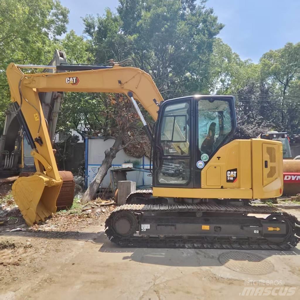 CAT 310 Midi bageri 7t – 12t