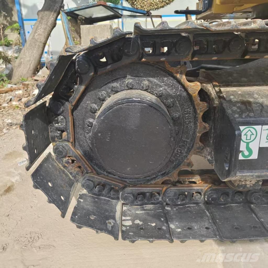 CAT 310 Bageri guseničari