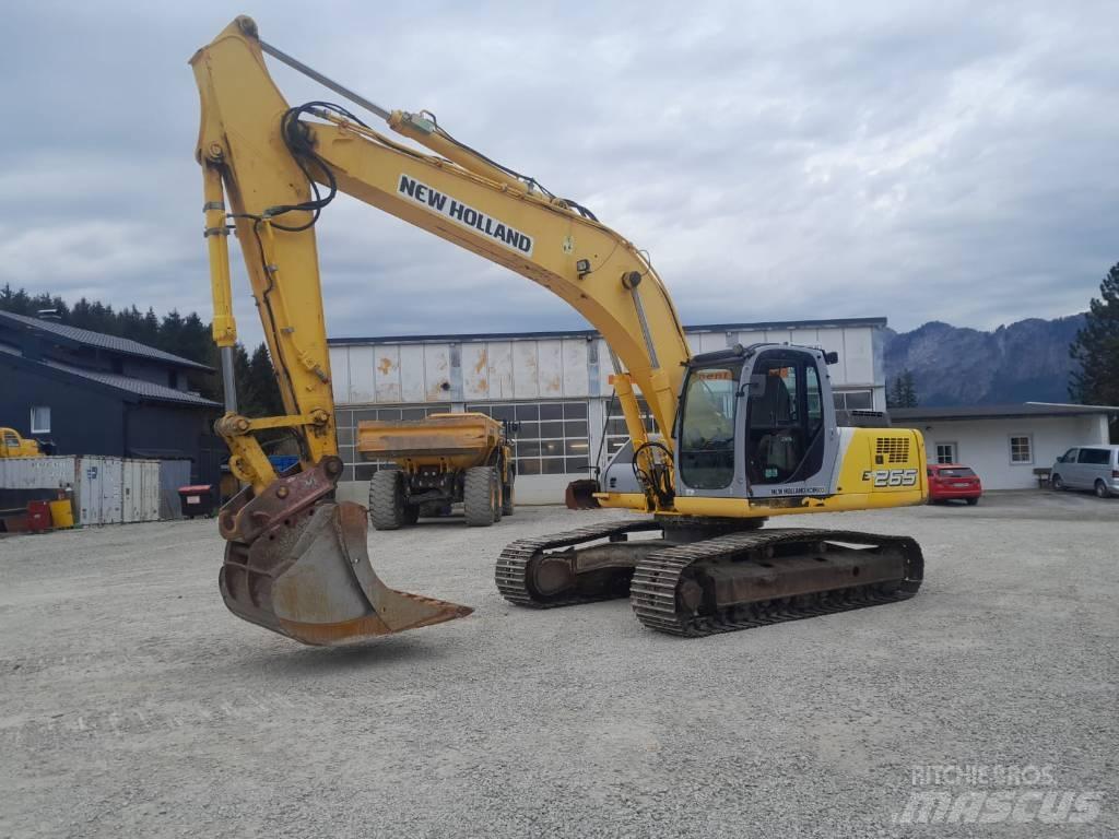 New Holland E 265 Bageri guseničari