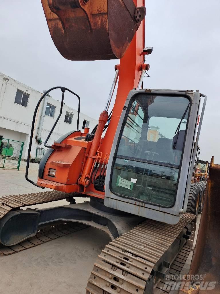 Hitachi ZX 135 US Bageri guseničari