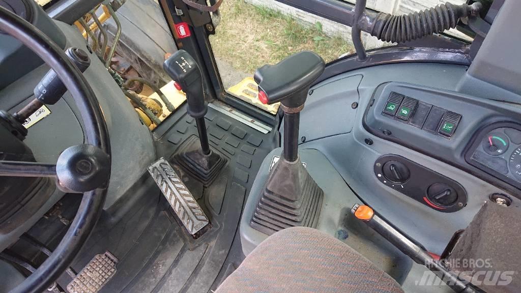 New Holland LB 110 Rovokopači