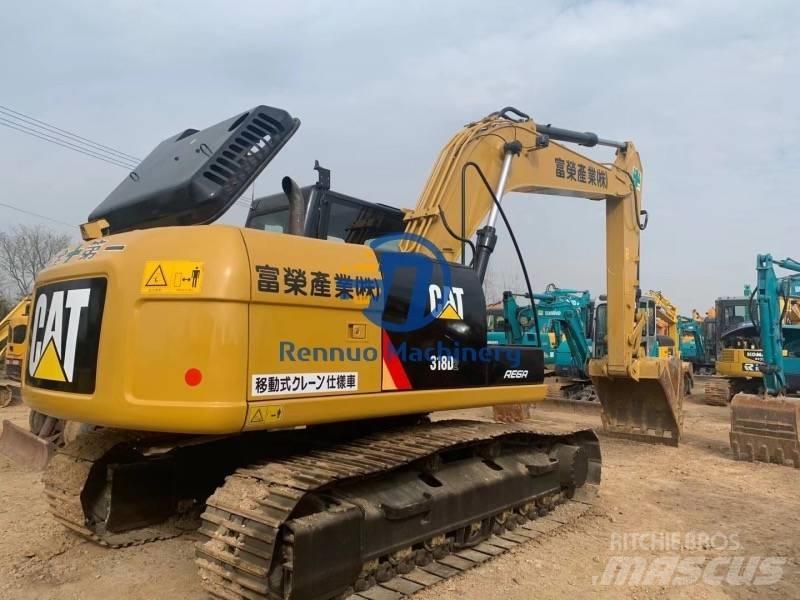 CAT 318DL Bageri guseničari