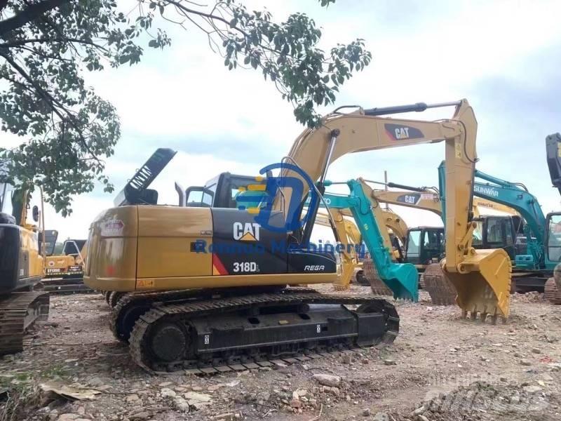 CAT 318DL Bageri guseničari