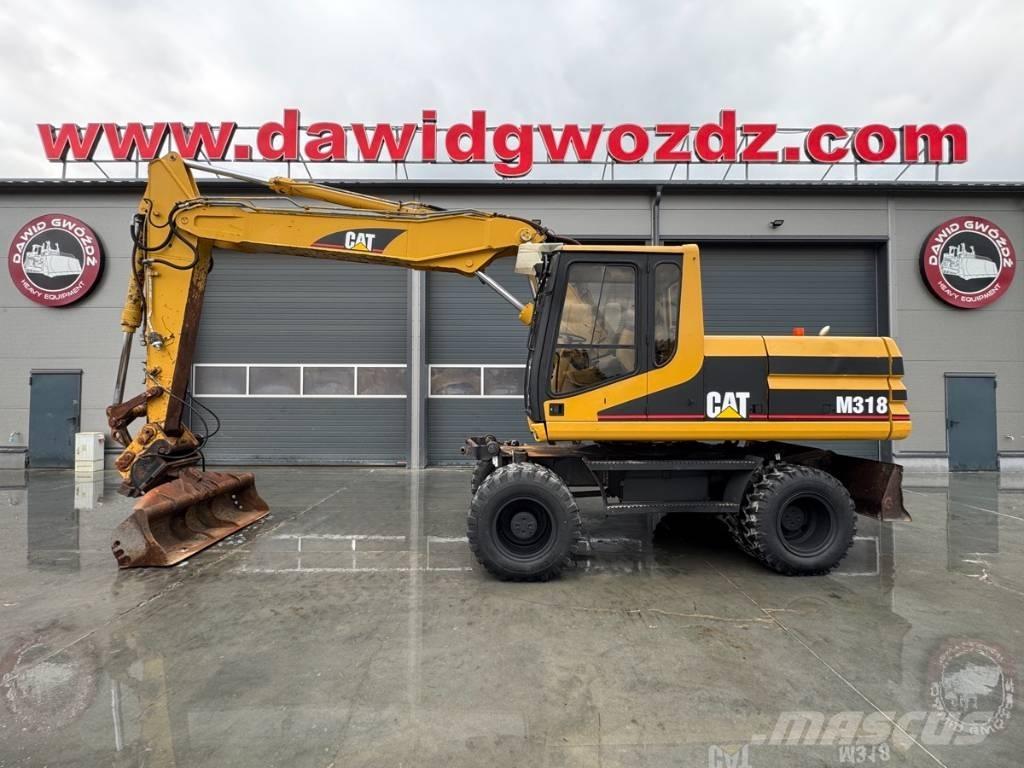 CAT M 318 Bageri točkaši