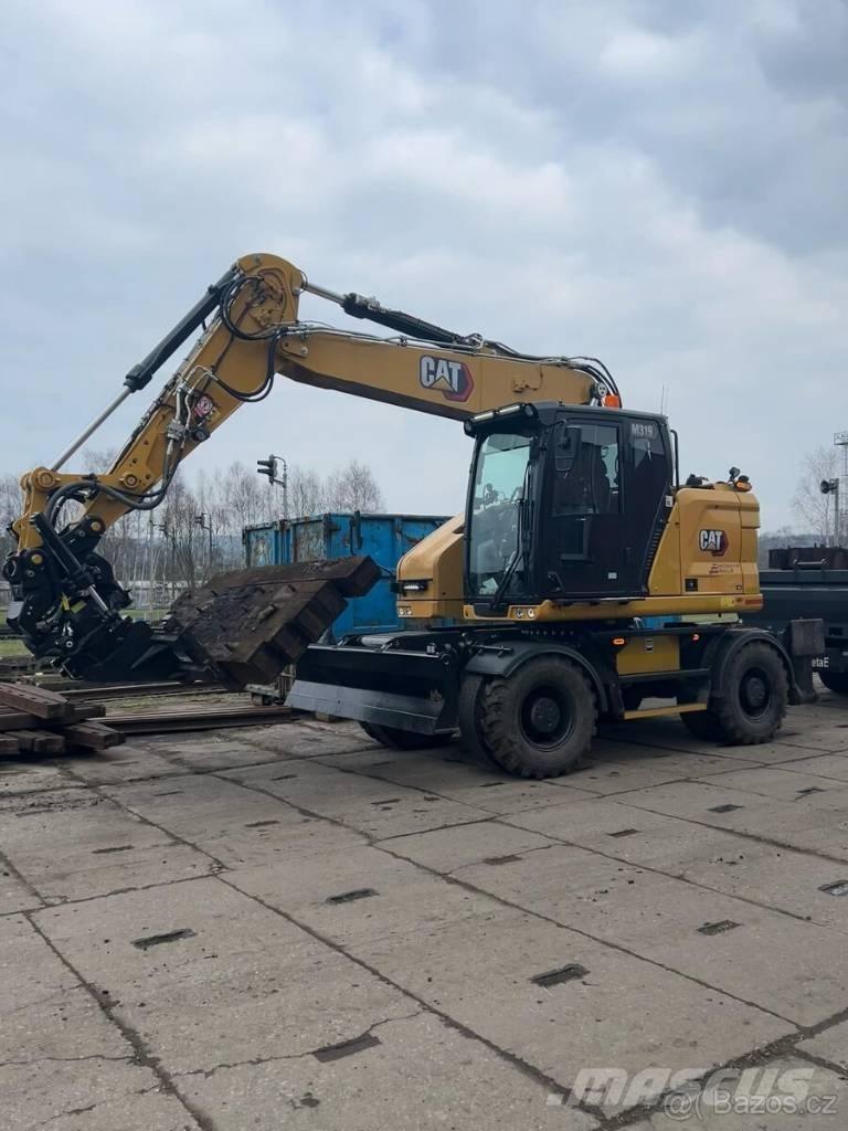 CAT M 319 Bageri točkaši