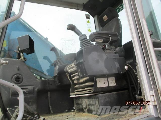 Fuchs MHL 320 Bageri za prenos primarnih/sekundarnih sirovina