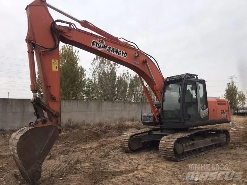 Hitachi zx210 Bageri guseničari