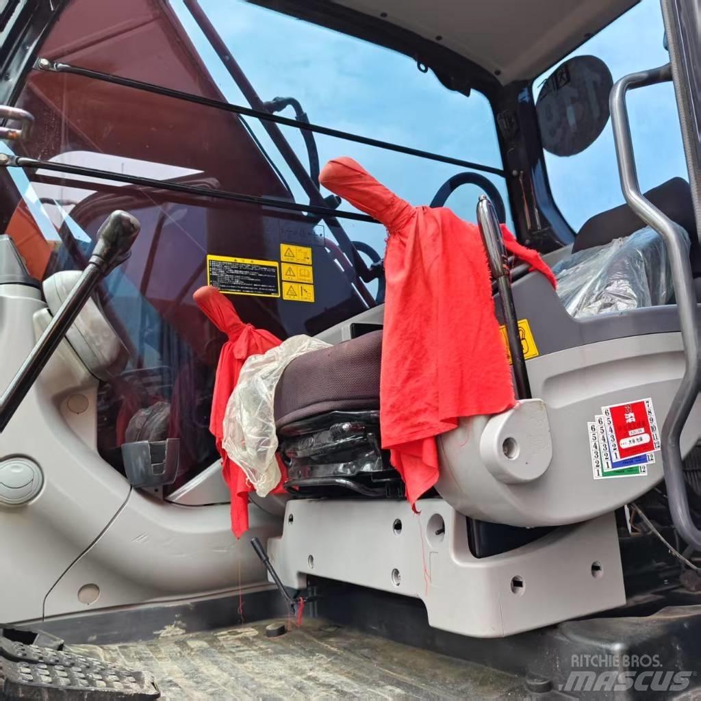 Hitachi ZX 210 Bageri guseničari