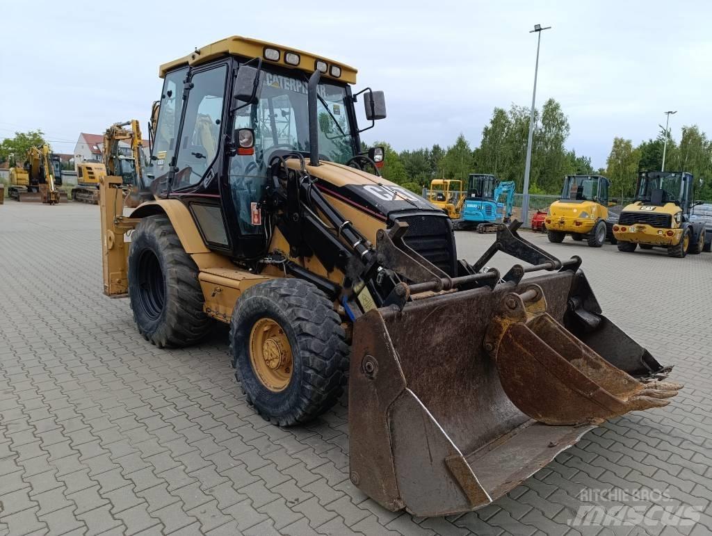 CAT 428 D Rovokopači