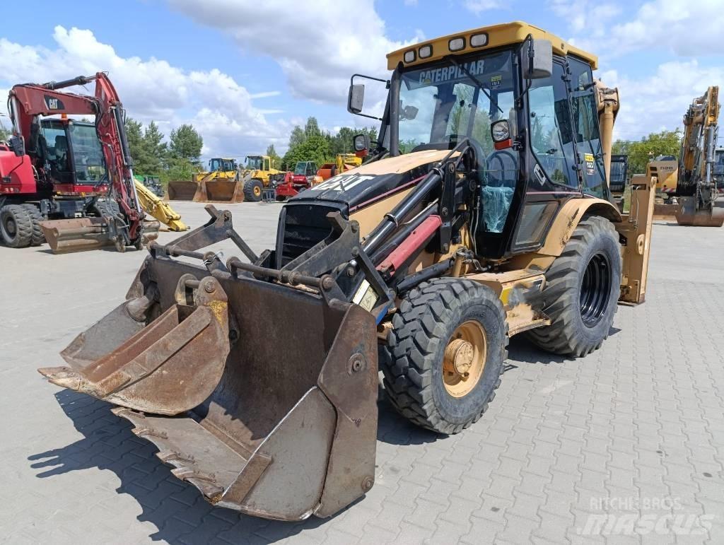 CAT 428 D Rovokopači
