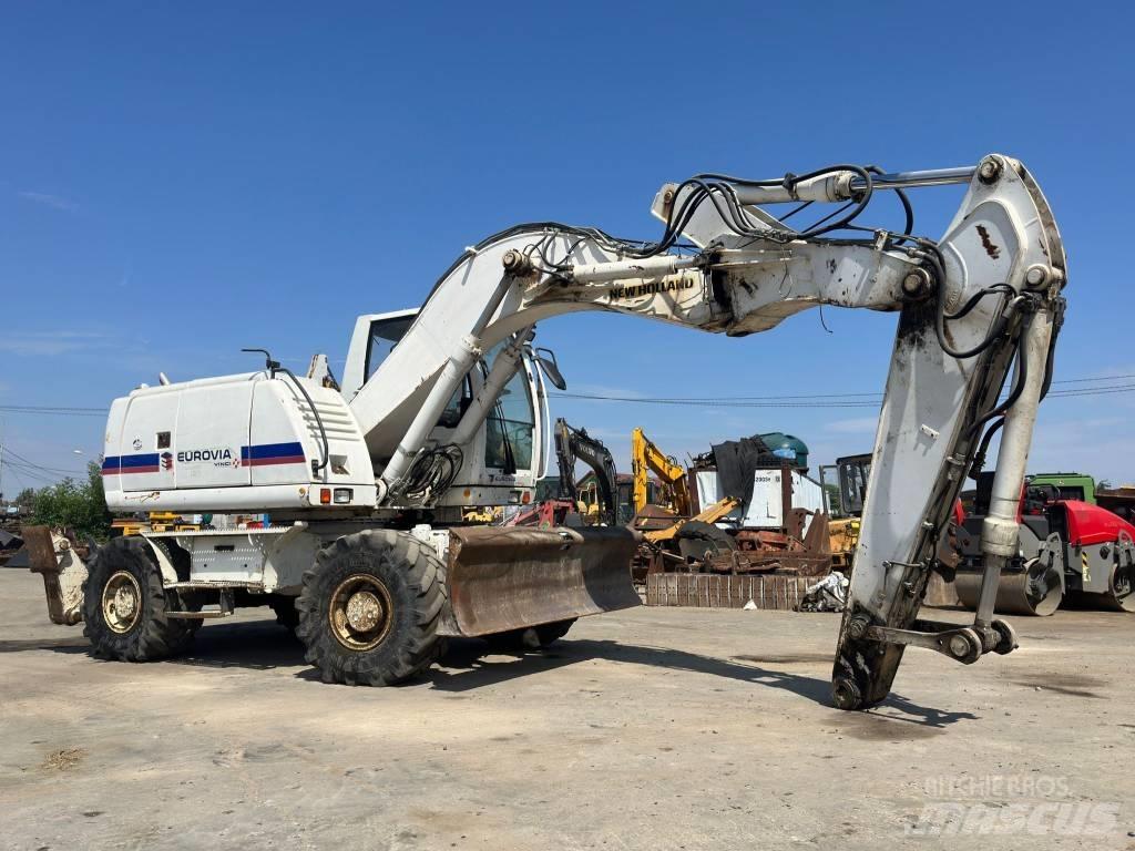 New Holland MH Plus Bageri točkaši