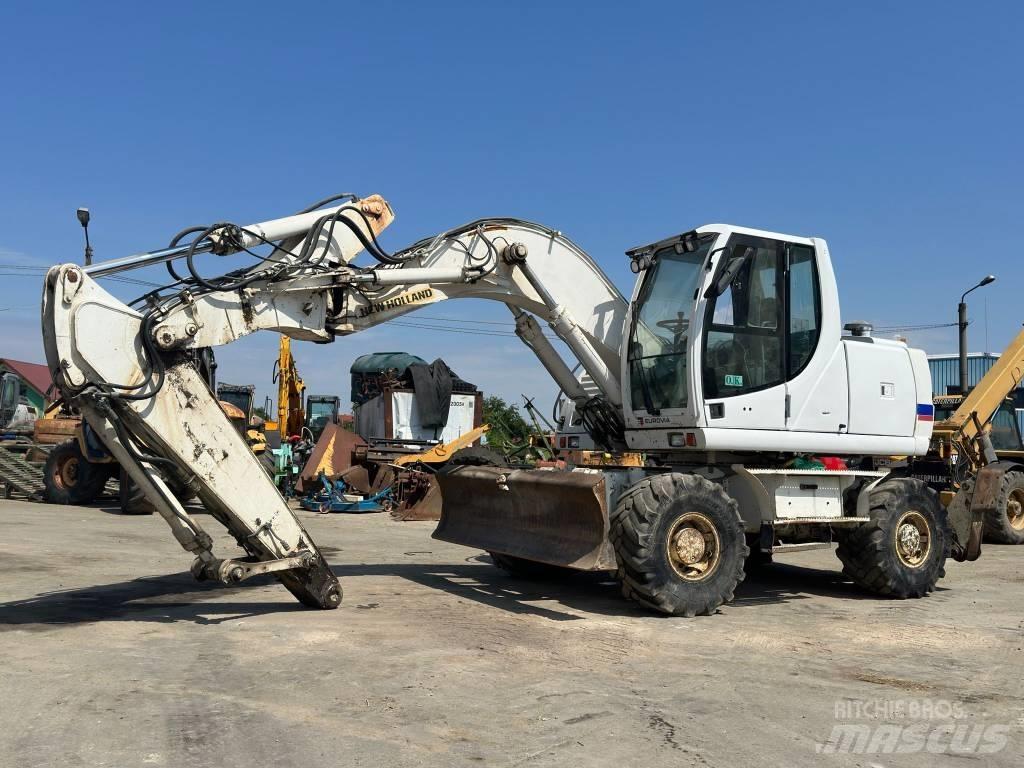 New Holland MH Plus Bageri točkaši
