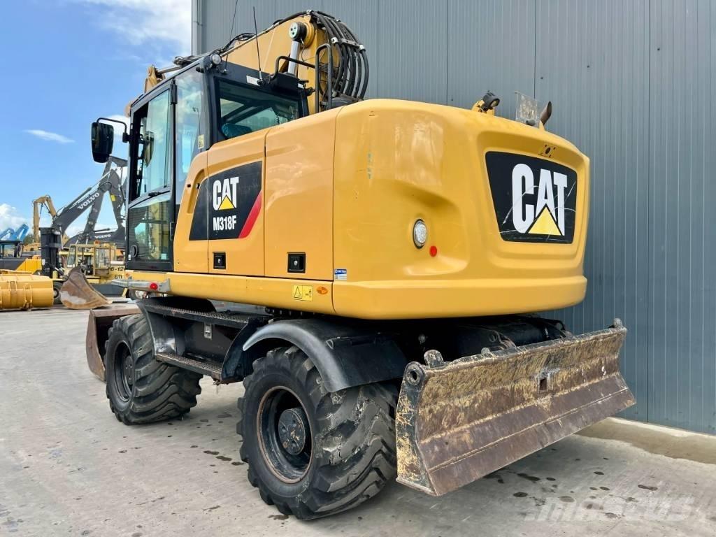 CAT M318F Bageri točkaši