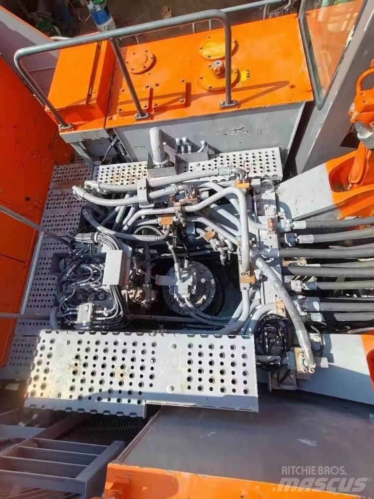 Hitachi EX 1200 Bageri guseničari