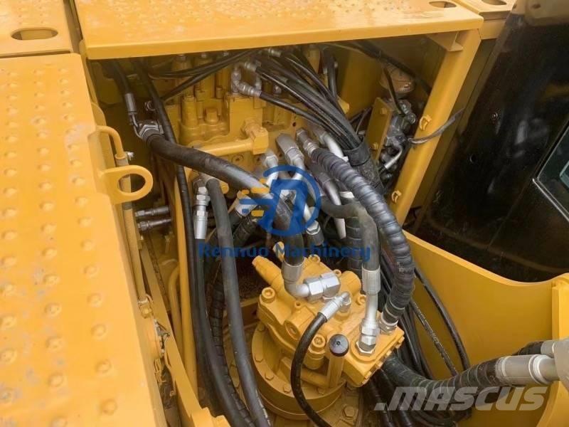 CAT 318DL Bageri guseničari
