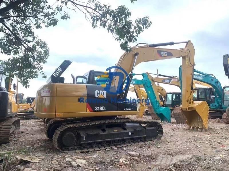 CAT 318DL Bageri guseničari