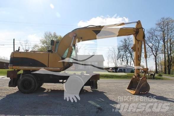 CAT M318C Bageri točkaši