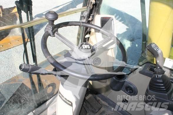 CAT M318C Bageri točkaši