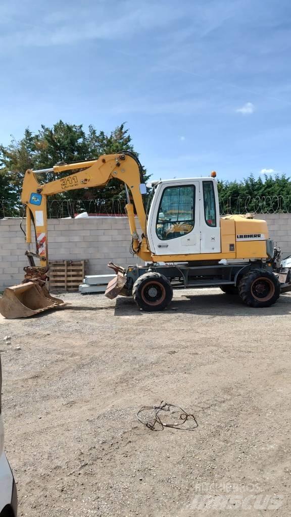Liebherr A 311 Bageri točkaši