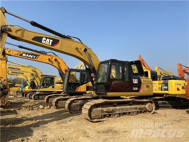 CAT 323D Bageri guseničari