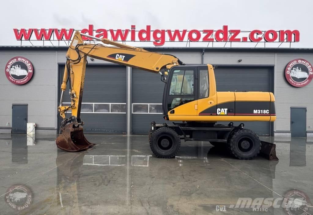 CAT M 318 C Bageri točkaši