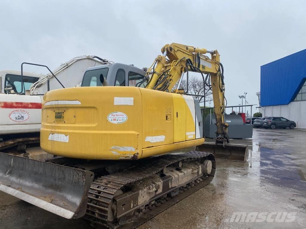New Holland E 145 Bageri guseničari