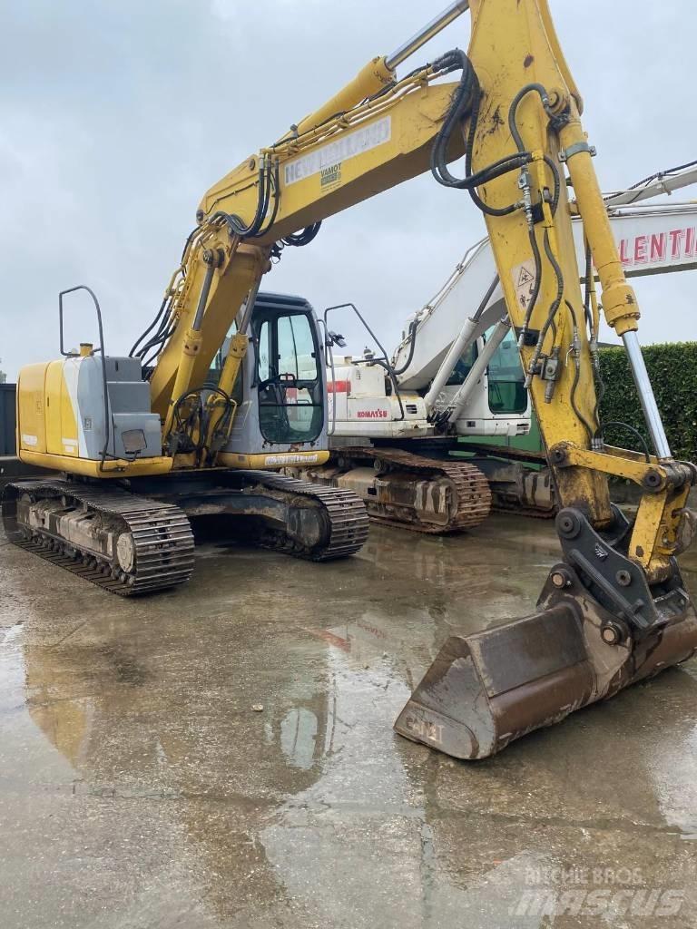 New Holland E 145 Bageri guseničari