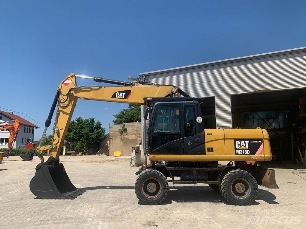 CAT M 318 D Bageri točkaši