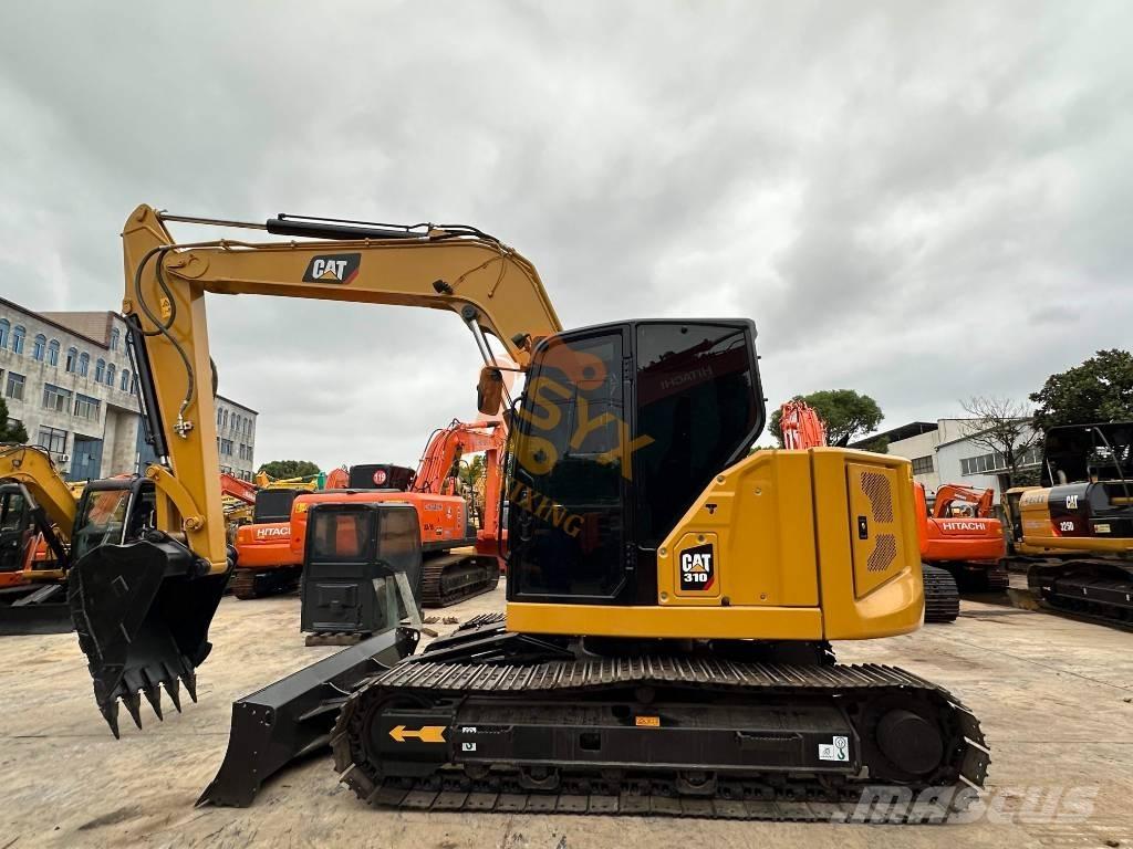 CAT 310 Mini bageri < 7t
