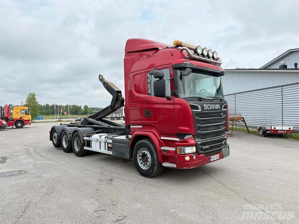 Scania R730 8x4 Rol kiper kamioni sa kukom za podizanje tereta