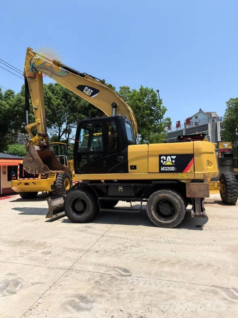 CAT M 320D2 Bageri točkaši