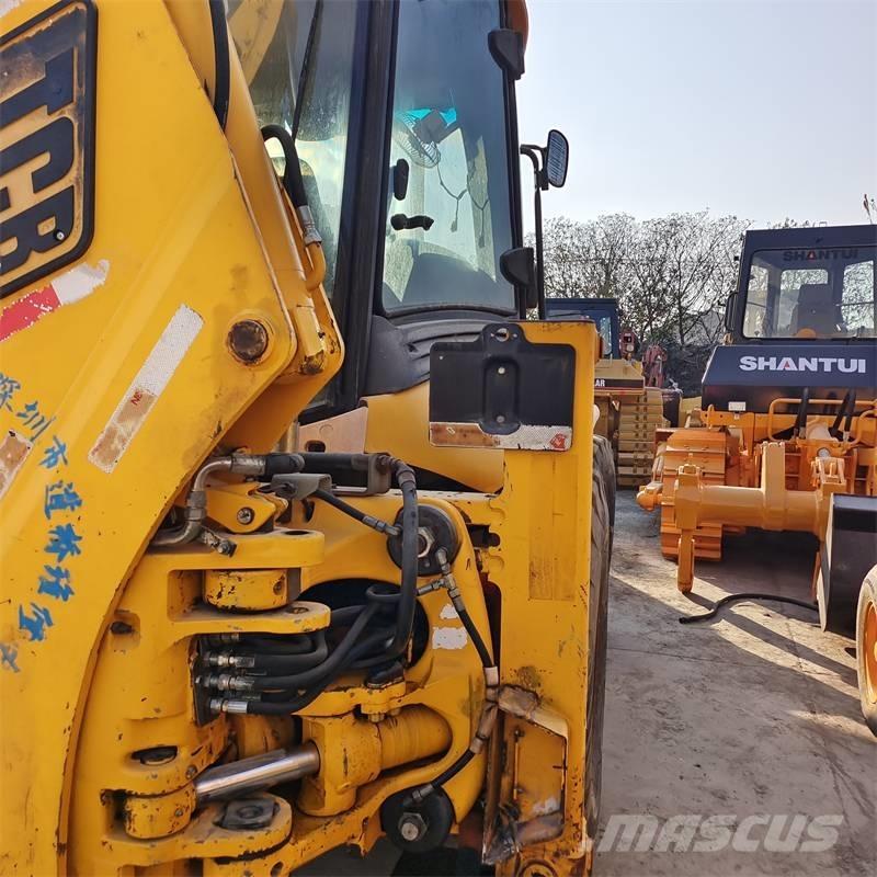 JCB 4 CX Bageri guseničari