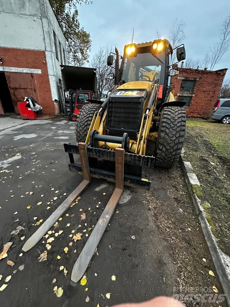 CAT 444F Rovokopači