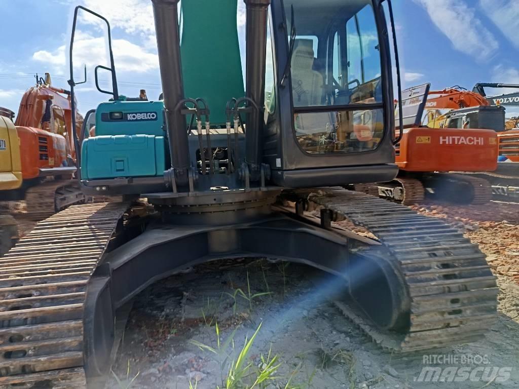 Kobelco SK210 Bageri guseničari