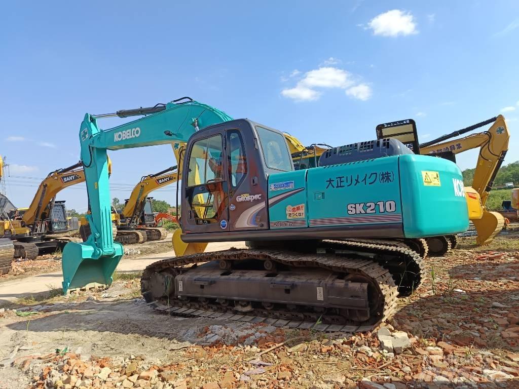 Kobelco SK210 Bageri guseničari