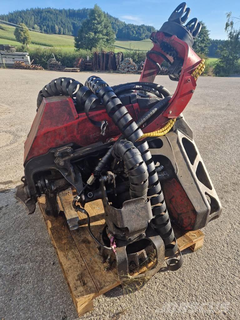 Komatsu 124 Mašine za kleščenje grane stabla