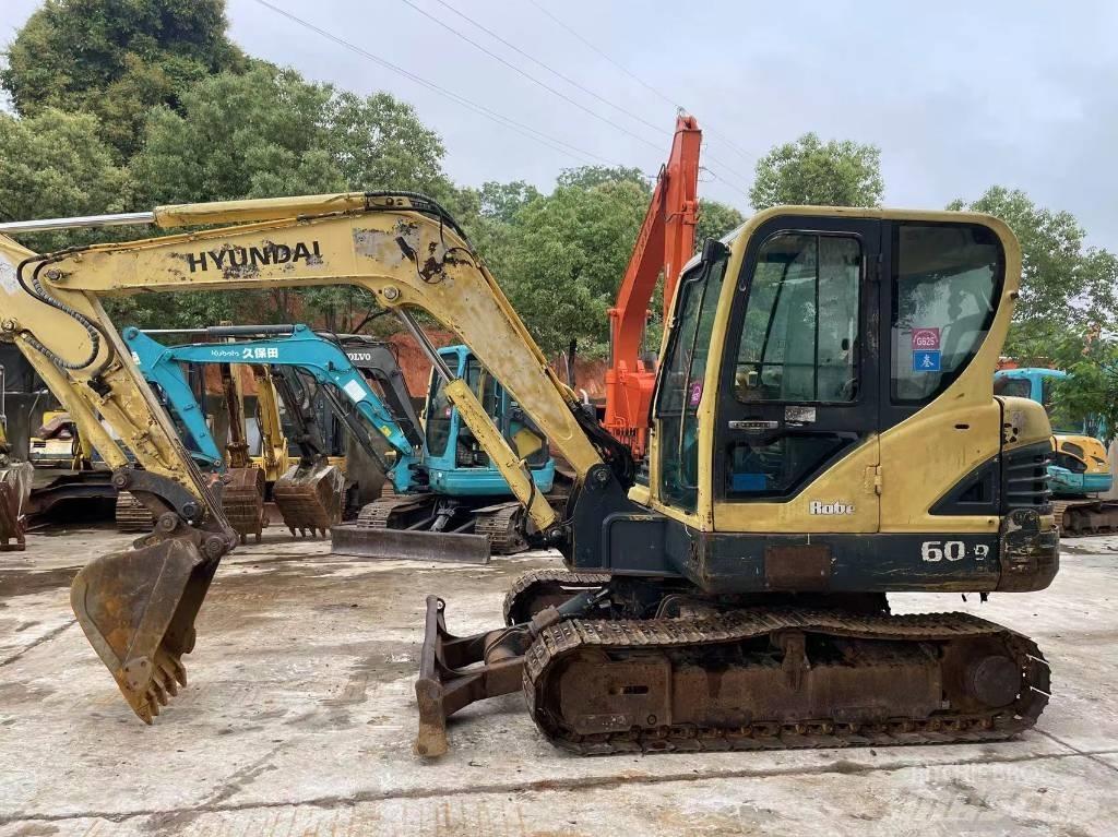 Hyundai R60-9 Bageri guseničari