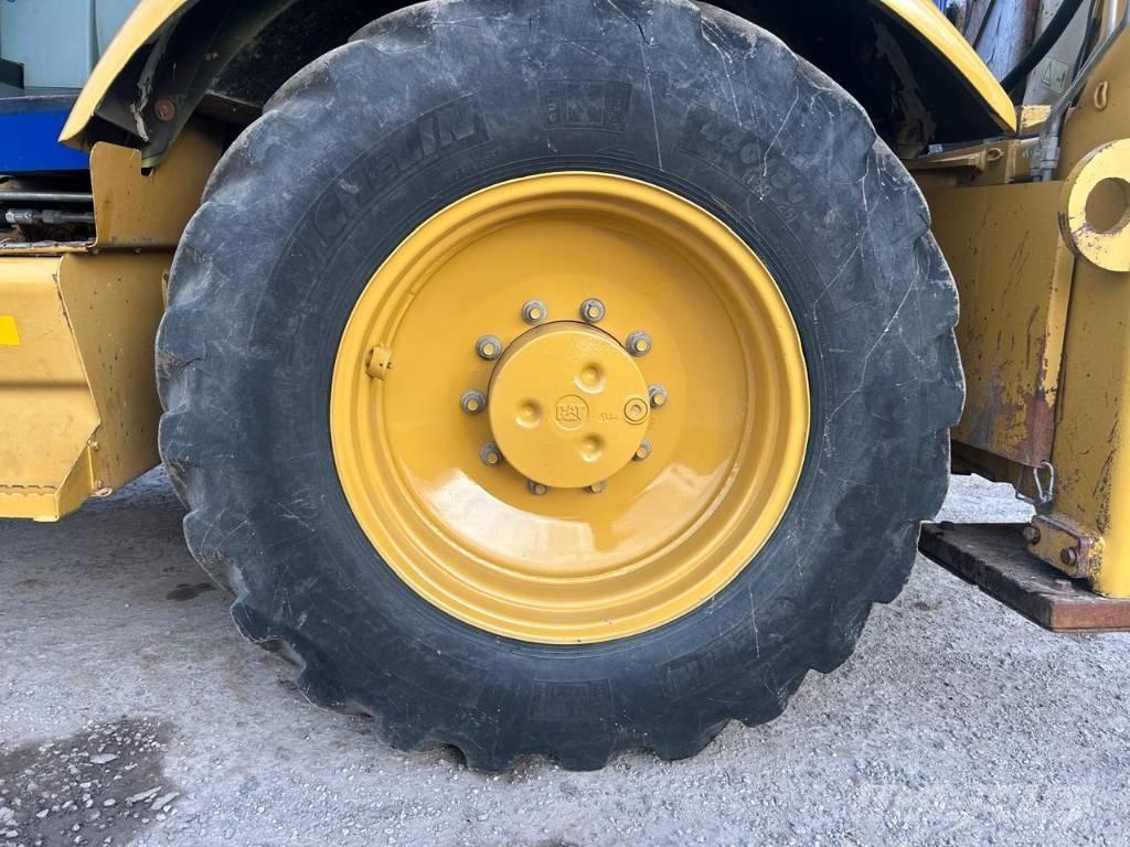 CAT 442 E Rovokopači