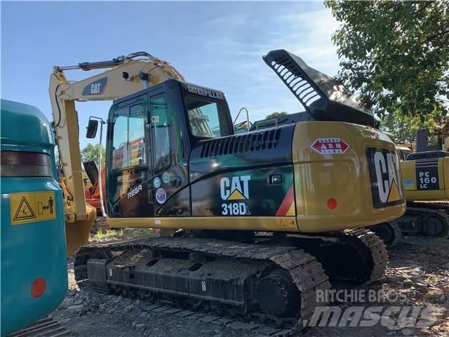 CAT 318DL Bageri guseničari