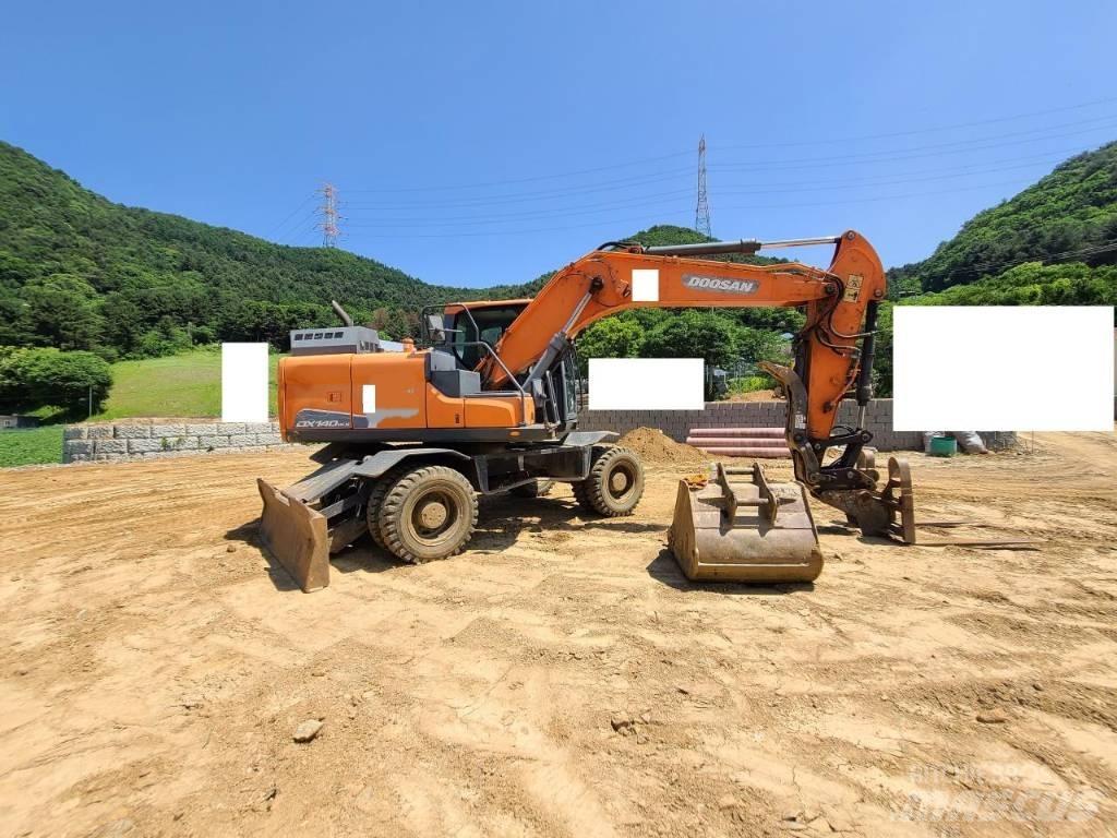 Doosan DX 140 W Bageri točkaši