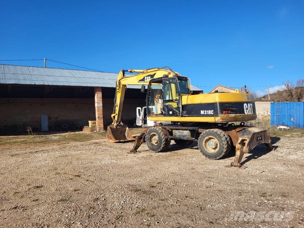 CAT M318c Bageri točkaši