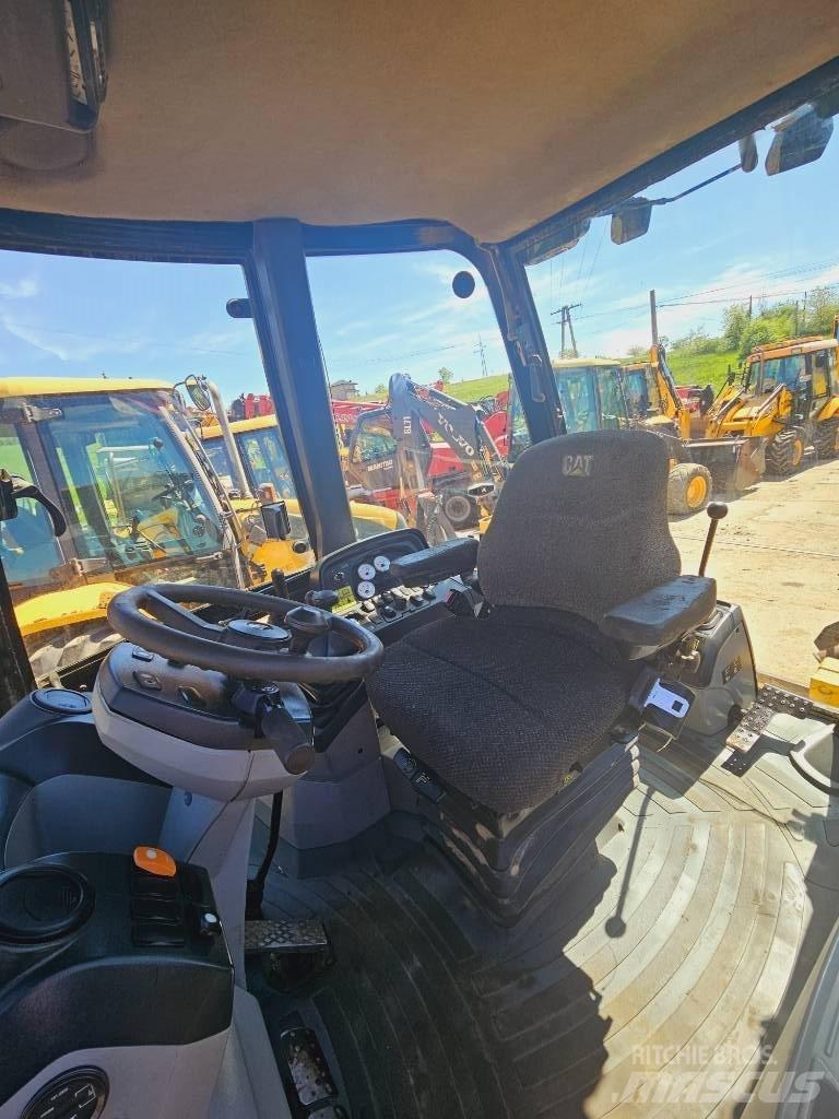 CAT 428 E Rovokopači