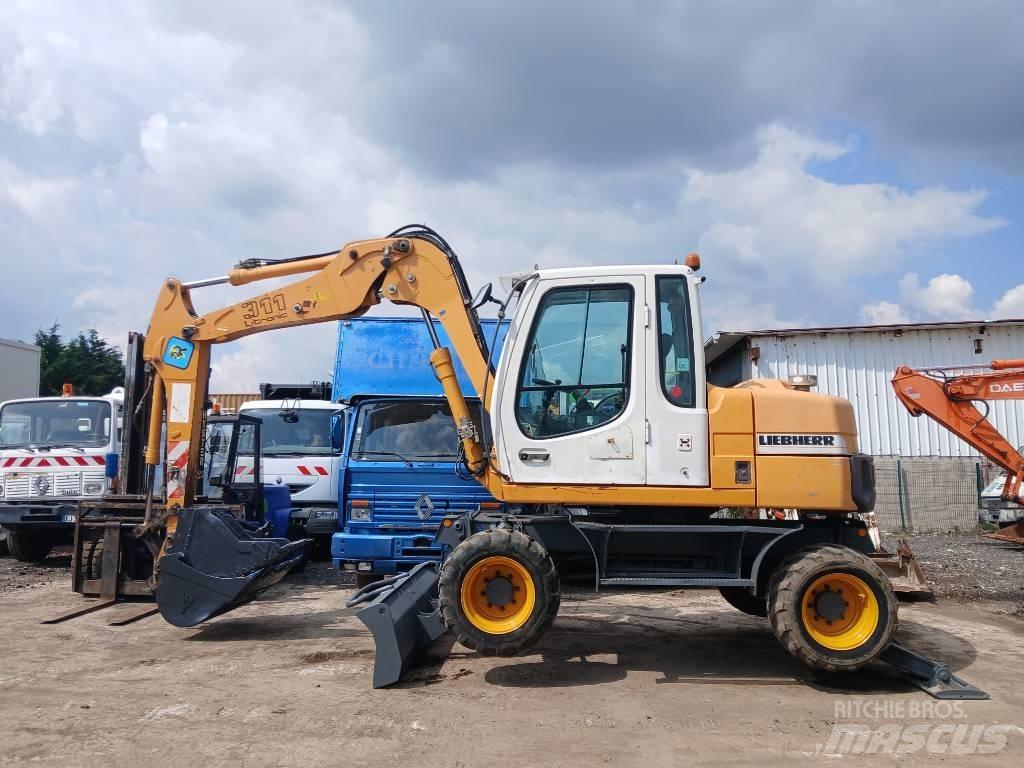 Liebherr A 311 Bageri točkaši
