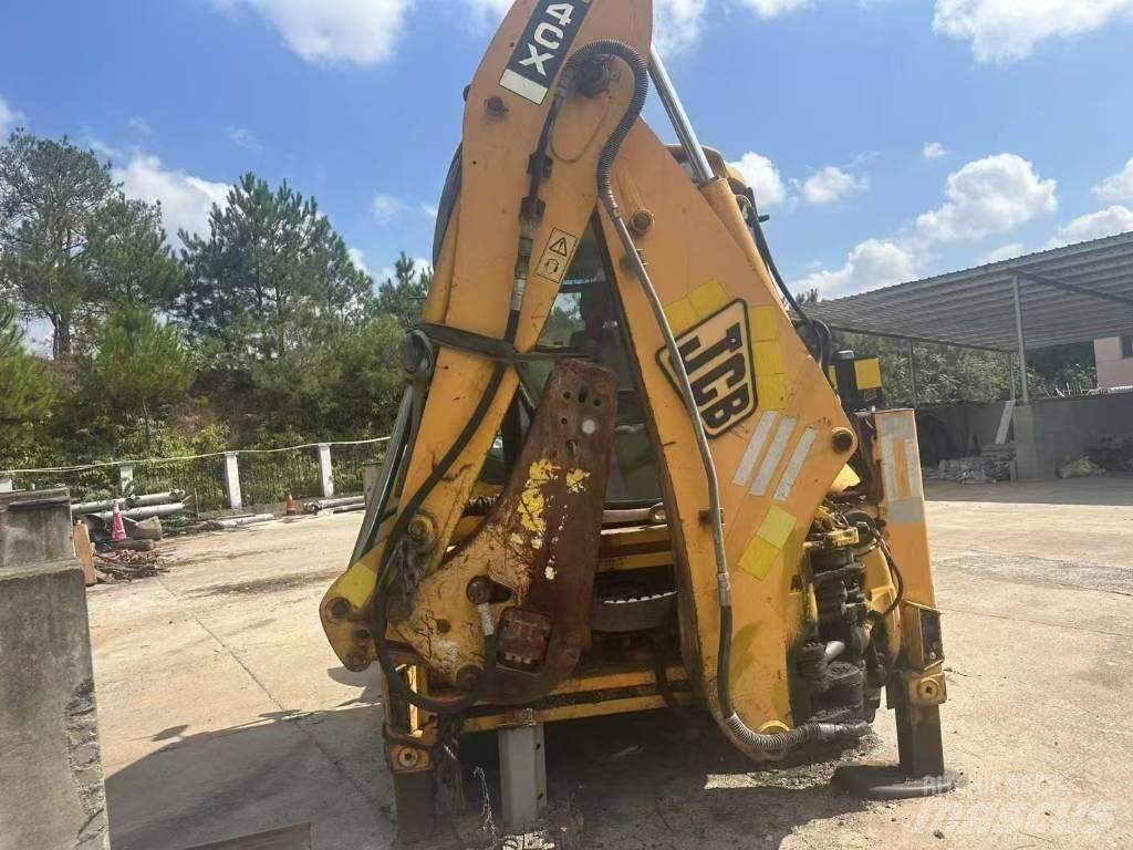 JCB 4 CX Bageri guseničari