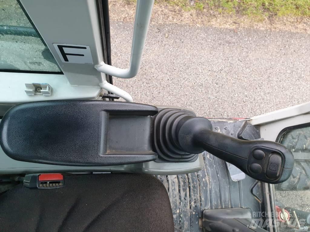Takeuchi TB 295 W Bageri točkaši