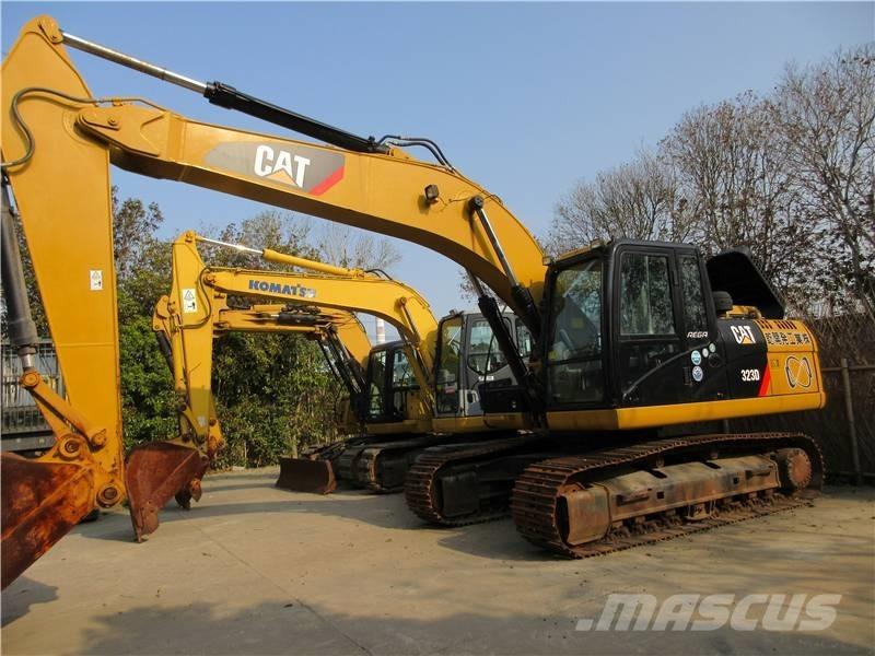 CAT 323 GC Bageri guseničari