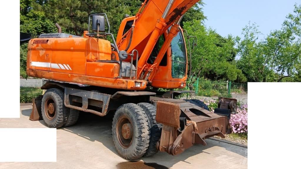 Doosan DX 210 W Bageri točkaši